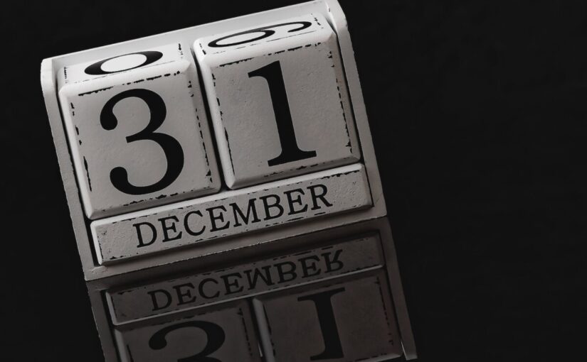 a white wooden perpetual calendar
